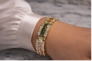Colorful thick bracelet on fabric